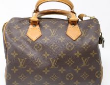 Sold at Auction: Louis Vuitton, Louis Vuitton - a Multipli Cité shopping  tote in brown monogram canvas and tanned leather trim, zip closure opens to  reveal red suede-lined interior, equipped with three